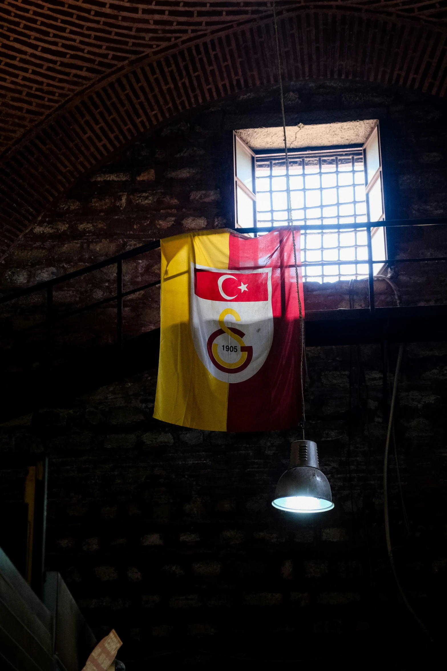 a flag with a window and some lights