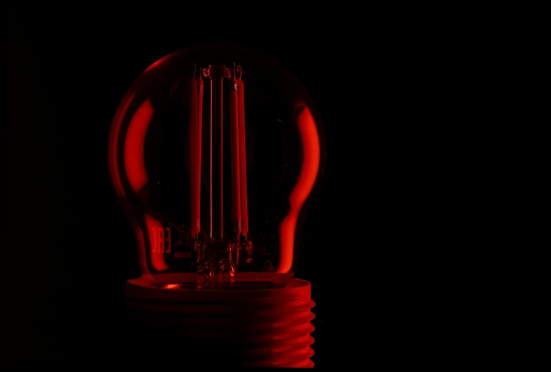 the light bulb has red lights on it