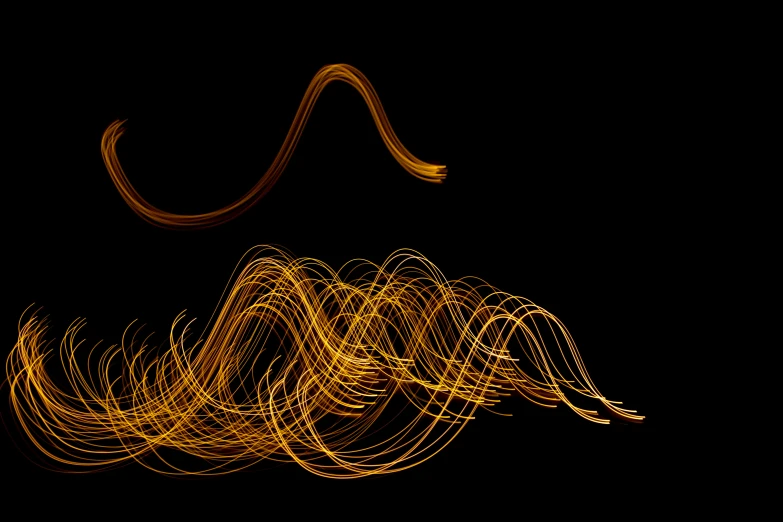 long - exposure image of an abstract line in yellow