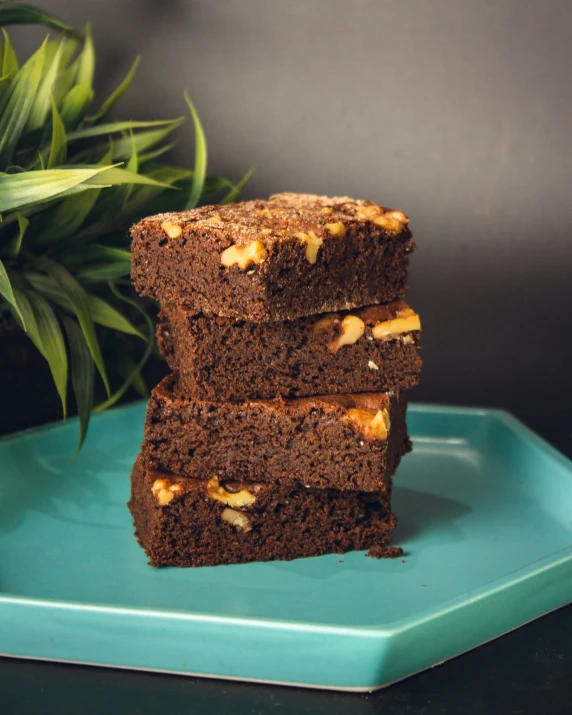 three pieces of brownie stacked on top of each other