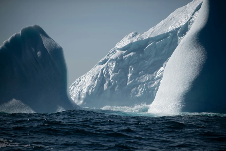 the ice is melting in the cold water