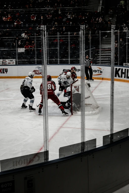 the hockey game is playing on the ice