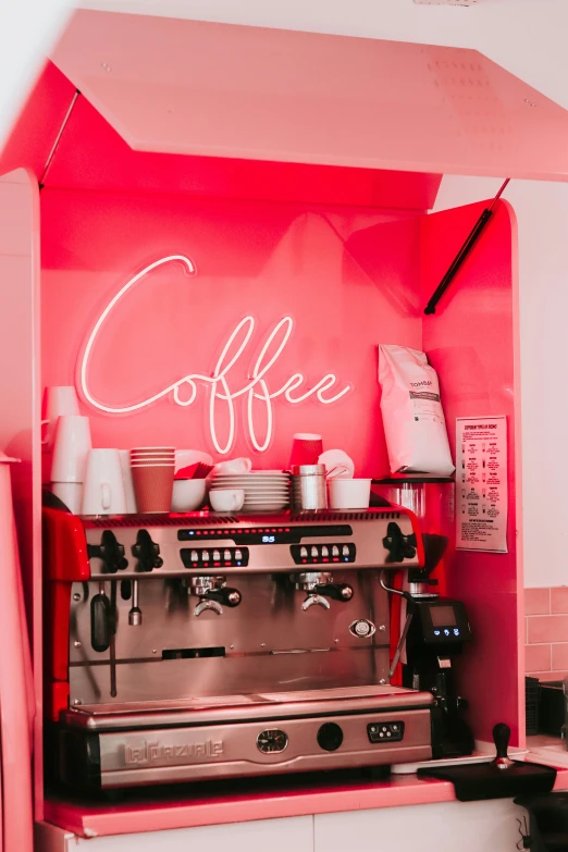 a coffee station has been transformed into a  pink display