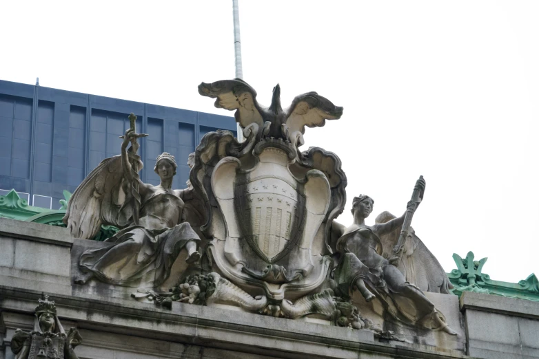 an elaborate architectural sculpture on top of a building