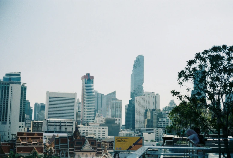 a view of a city from a distance of buildings