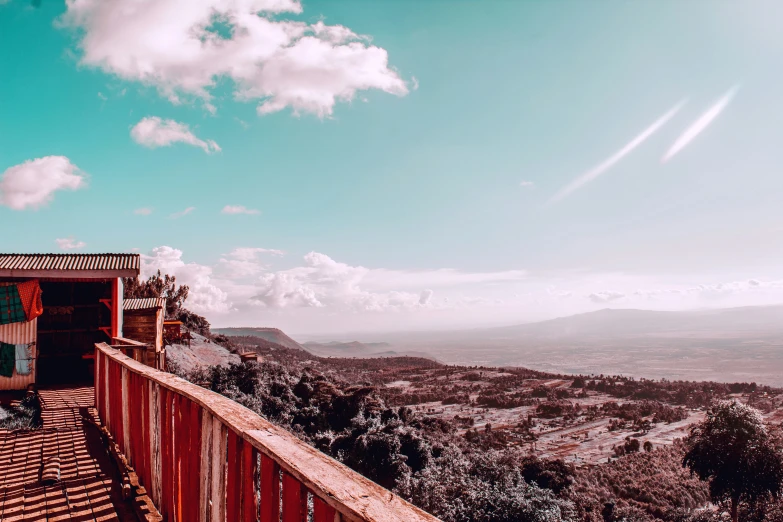 an outdoor covered in wood with a view