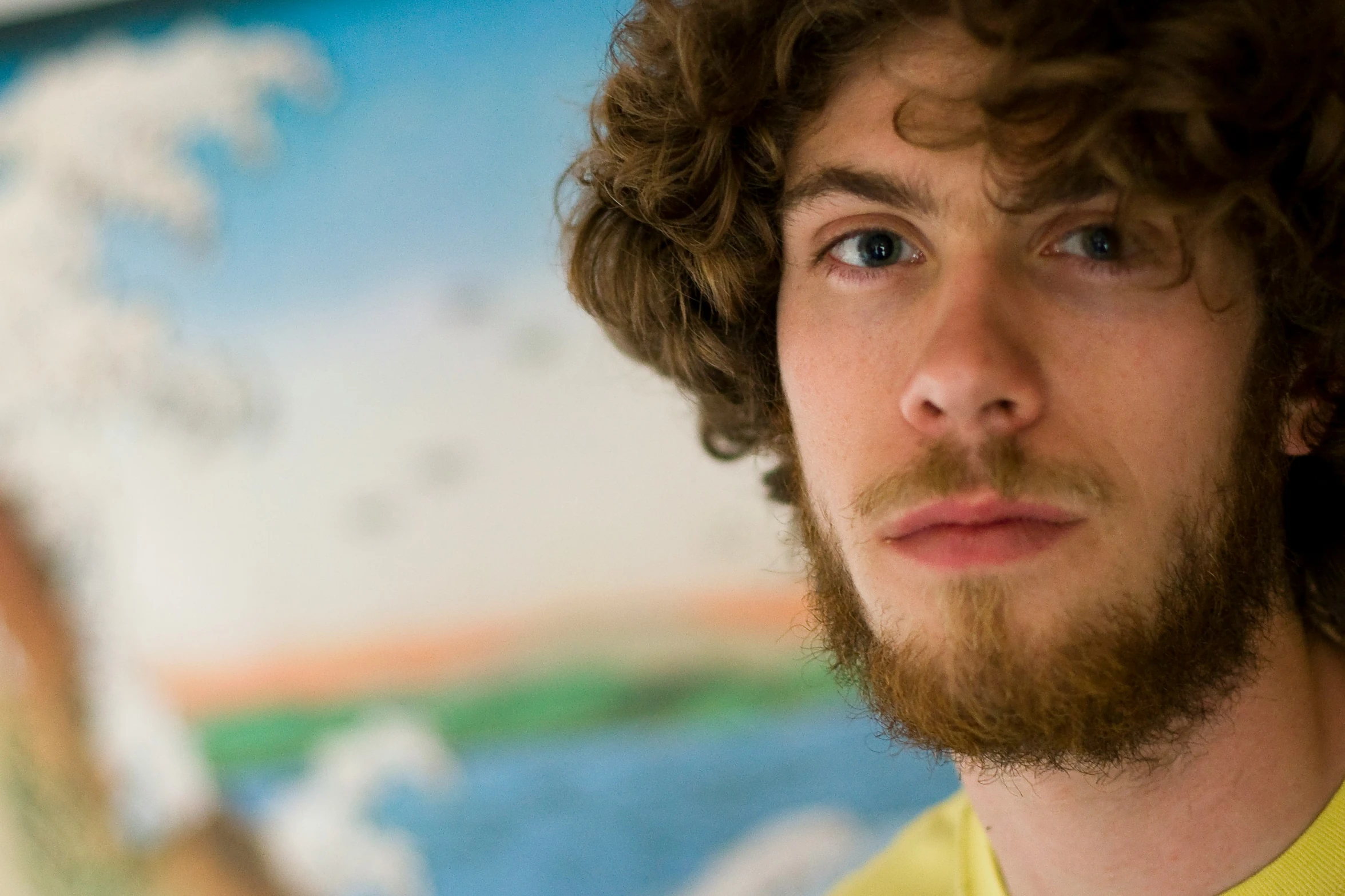 a close up s of a man looking at the camera