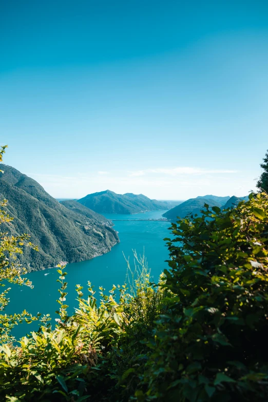 a large lake sitting on the side of a mountain