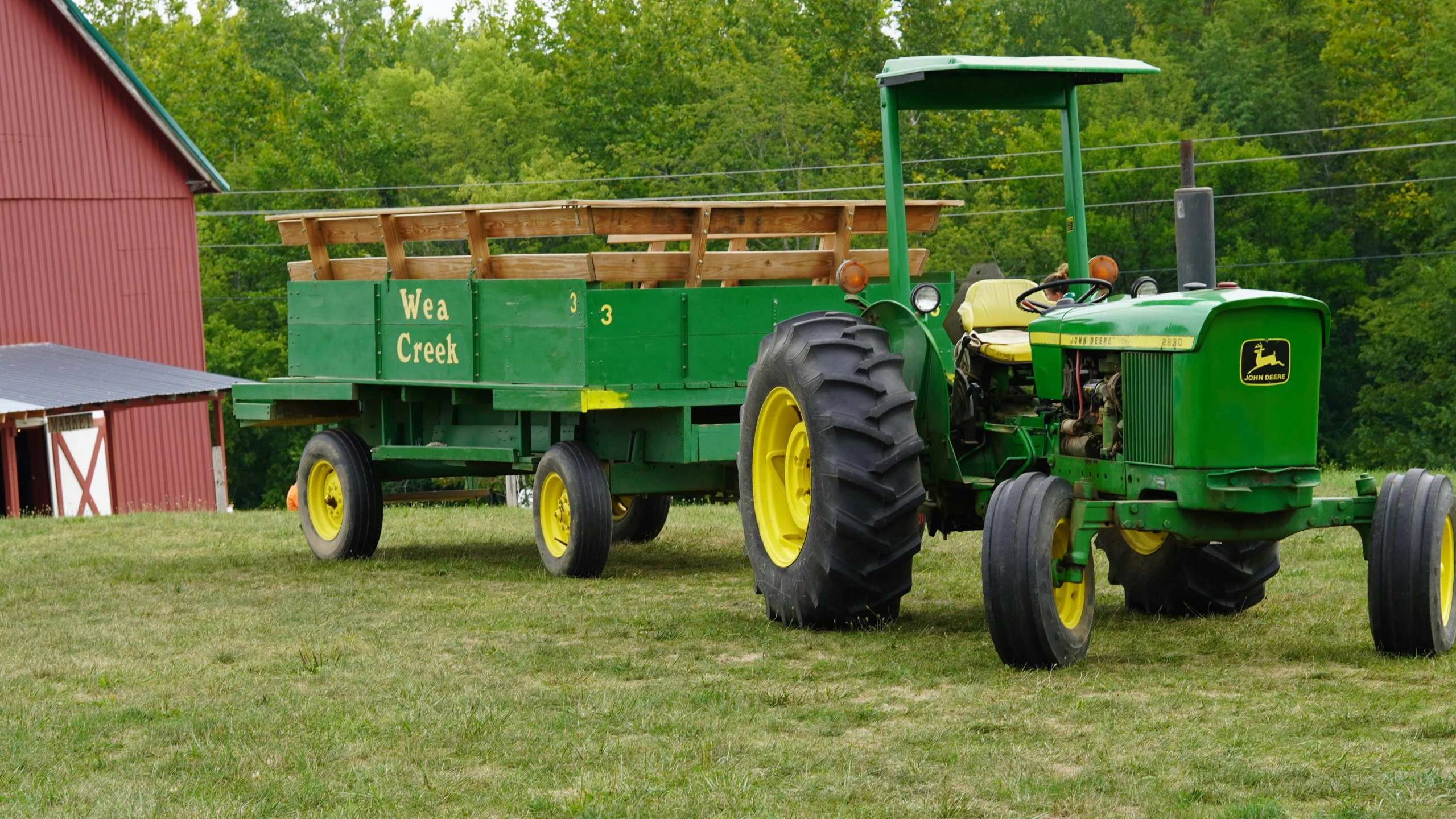 a tractor with a trailer in the middle