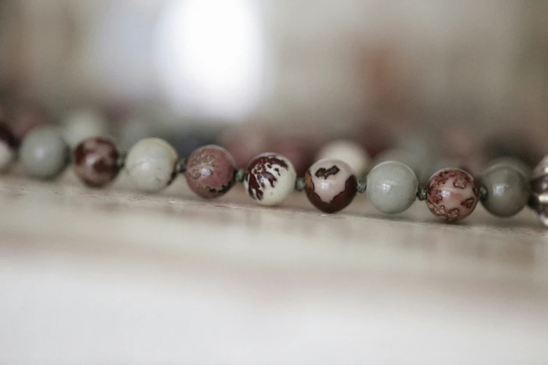 an elegant bead line with several stones in different colors