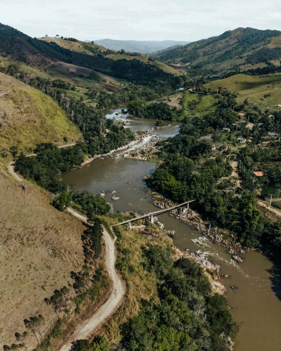 view from an aerial po of some water and hills