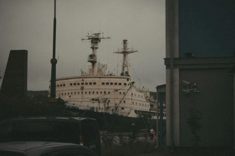 the large ship is docked on the dock