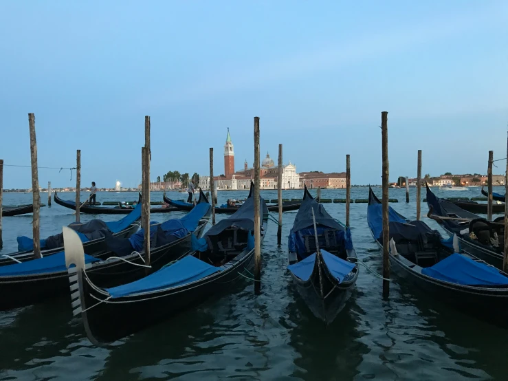 the boats are tied up together in the water