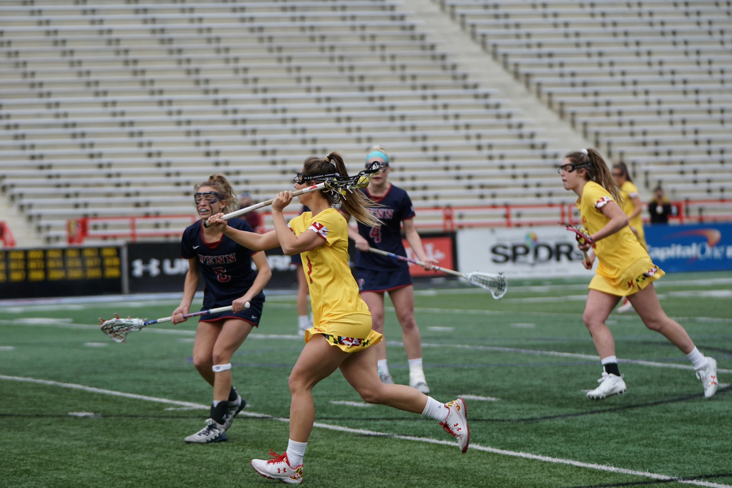 the girls lacrosse team looks like they are fighting for a berth