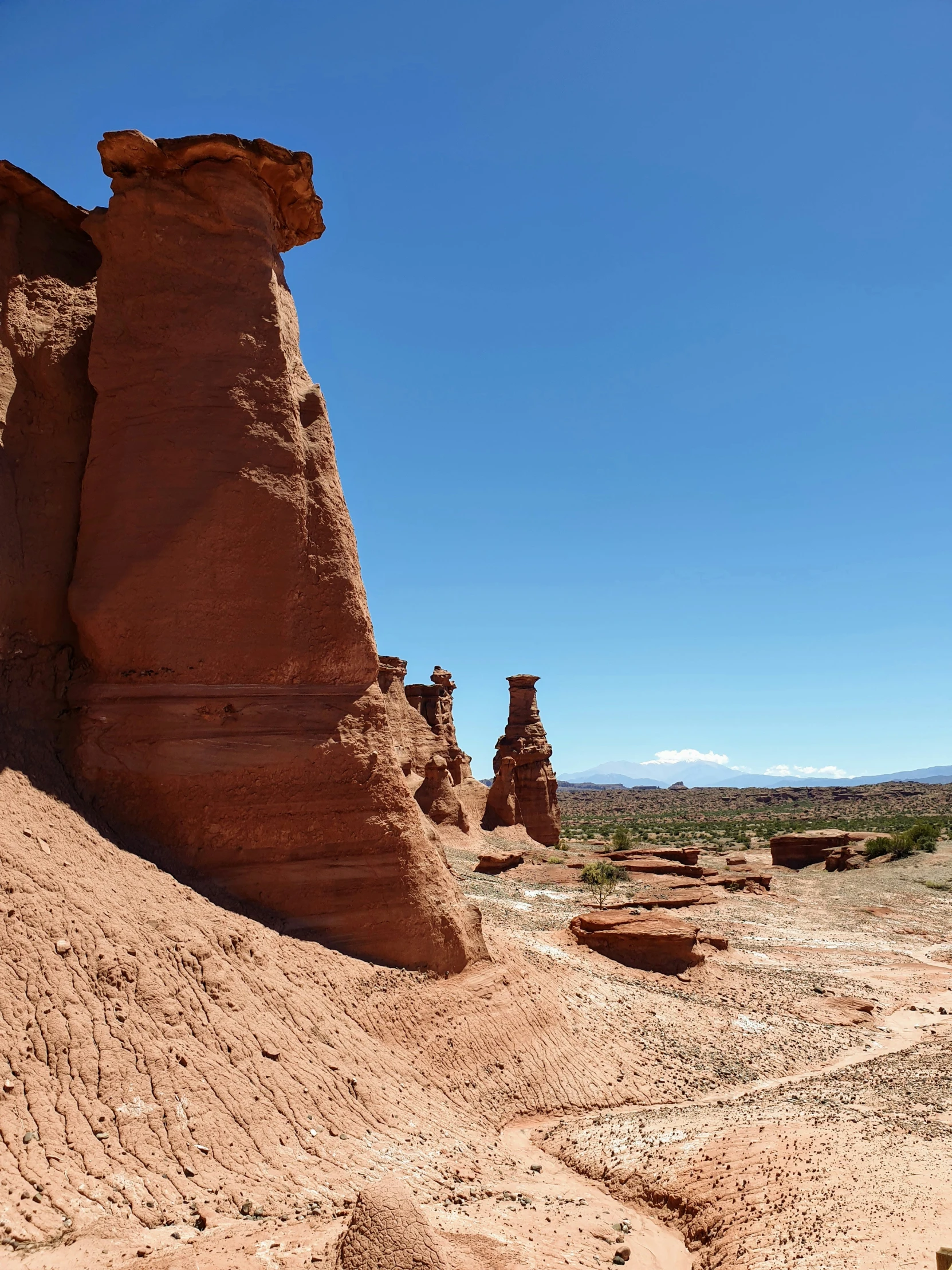 a dirt hill covered in mud and sand