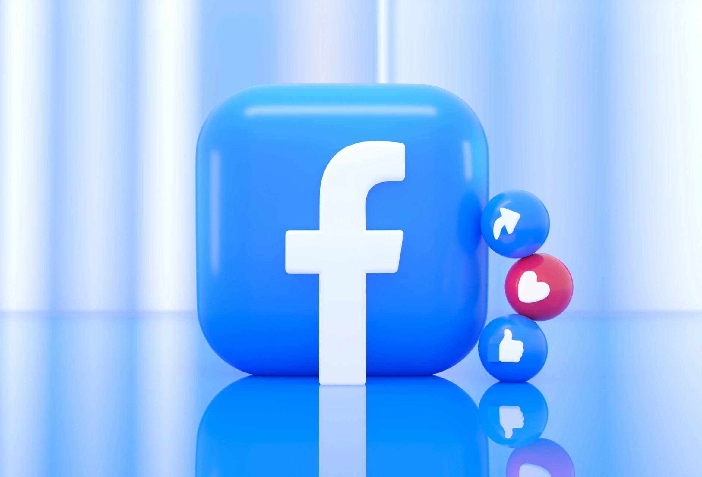 two dices sit next to an applicance that includes facebook logo