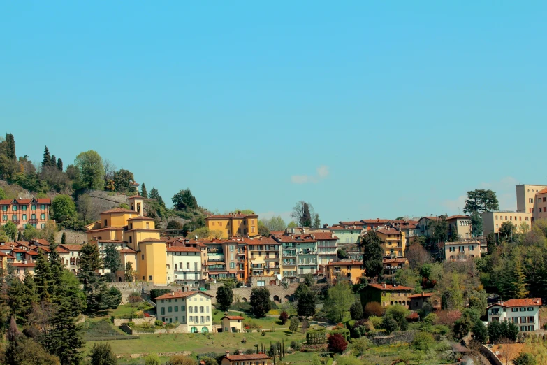 a mountain city with an alpine lodge in the foreground