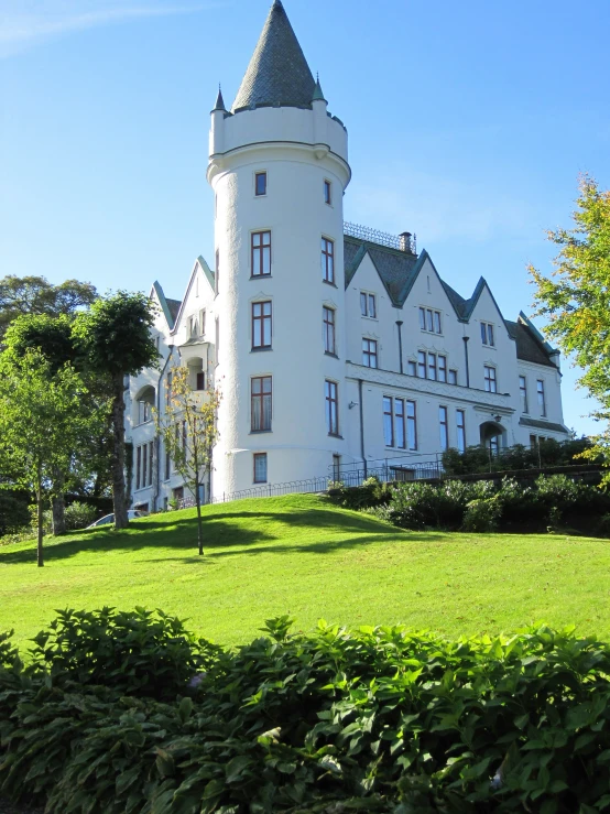 a white castle like structure with a clock tower