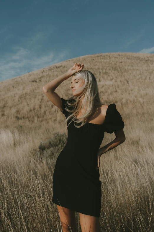 an image of a woman that is walking in a field