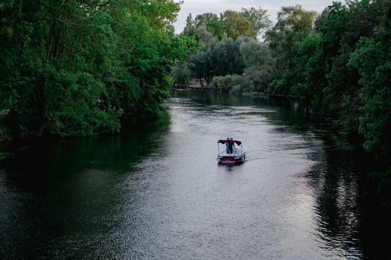 a boat is moving through the water with a man on it