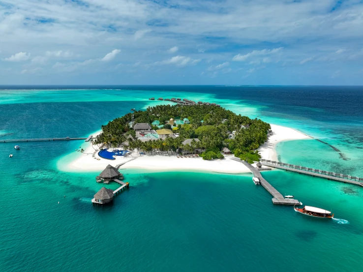 a tropical island with a white sand beach