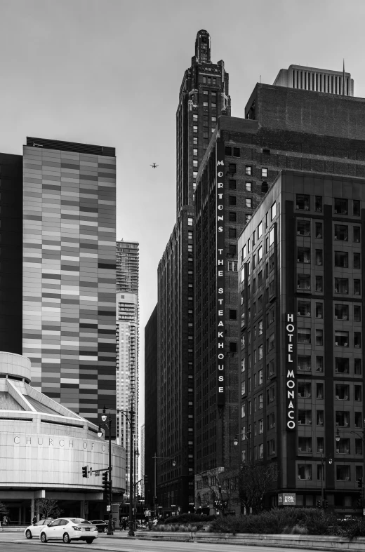 black and white pograph of tall buildings in an urban area