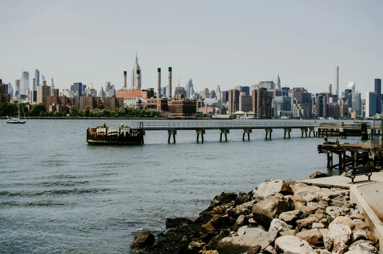 the city skyline shows buildings, water and docks