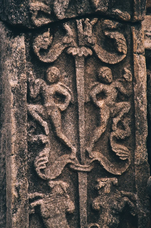 intricate carved stone ornament on an ancient temple