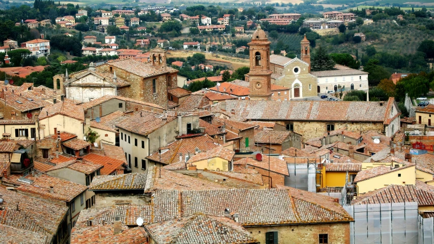 many small houses with towers and red roofs