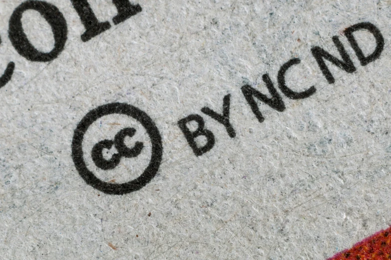 a close up of a large cement slab with writing on it