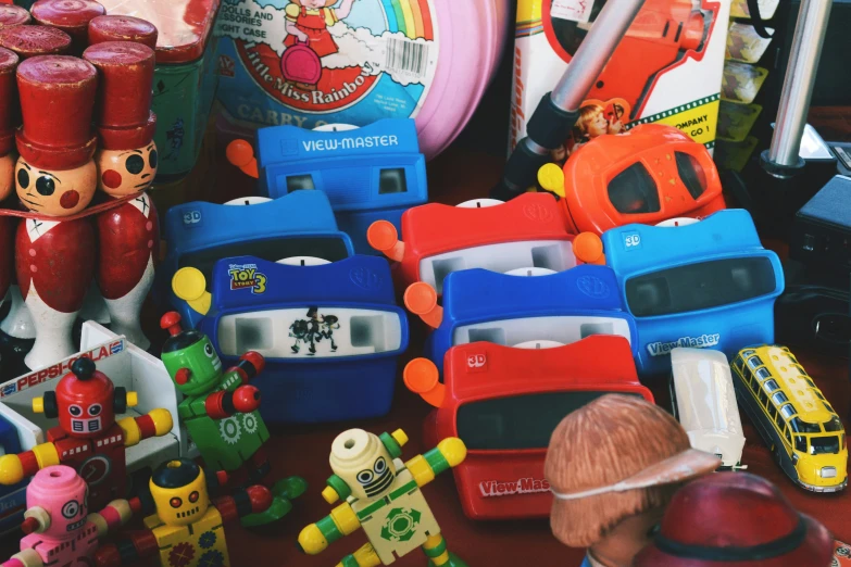 many toys such as small rubber cars are stacked in the pile