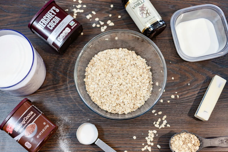 ingredients for a peanut er and oatmeal breakfast including milk, oats, er, and sugar