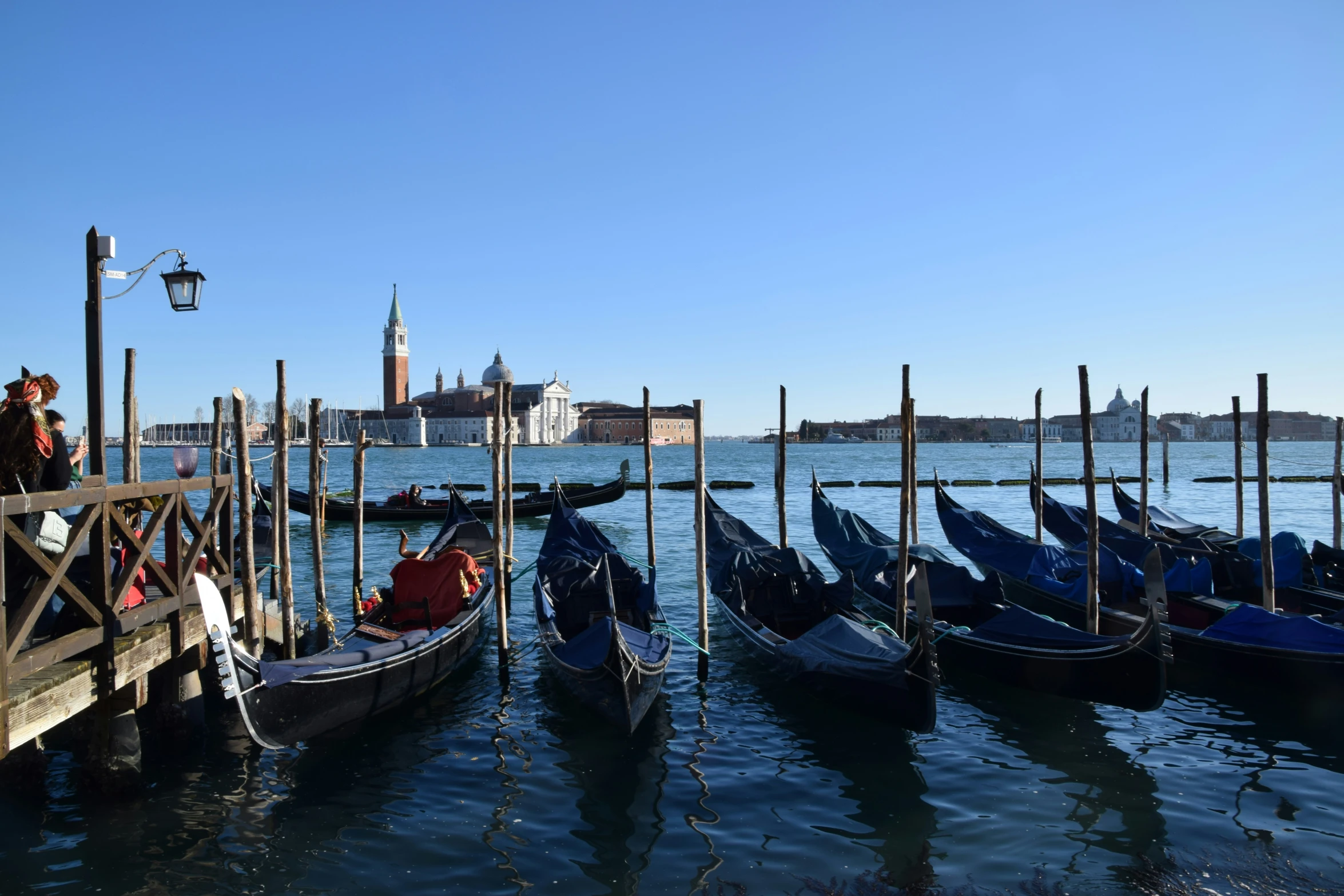 several boats that are sitting on the water