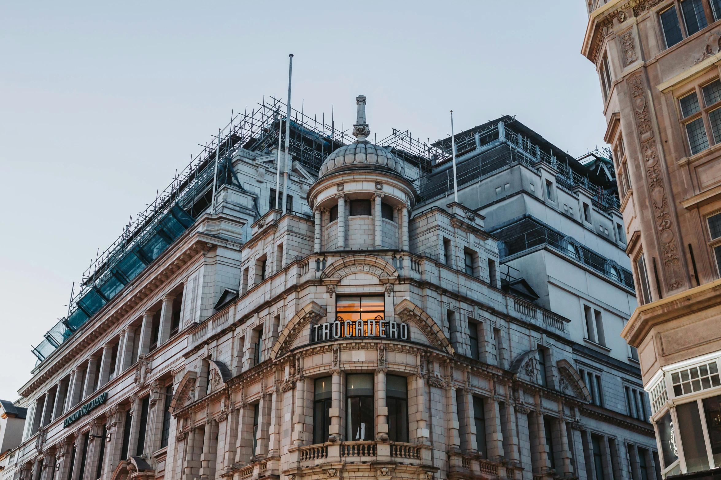 an old building with scaffolding on its side