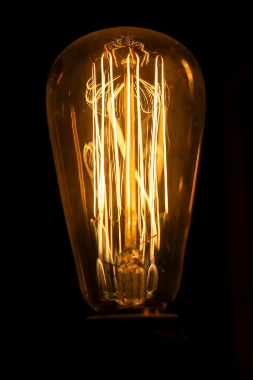 an old light bulb on a dark background
