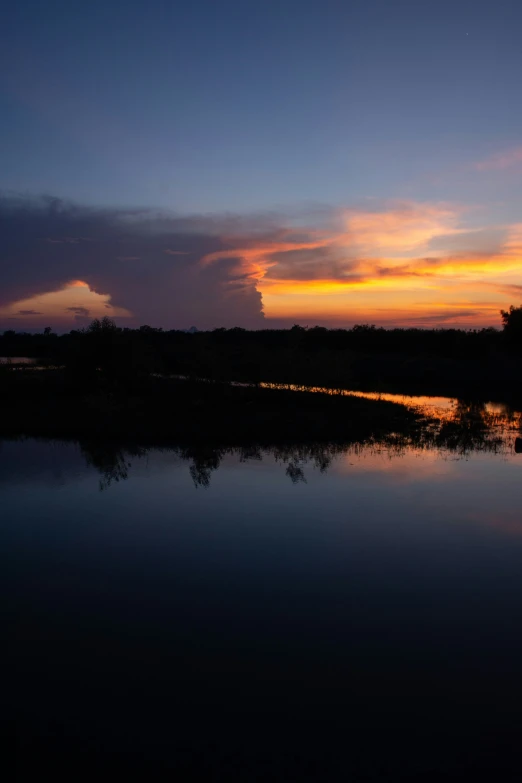 there is a very nice sunset over the water