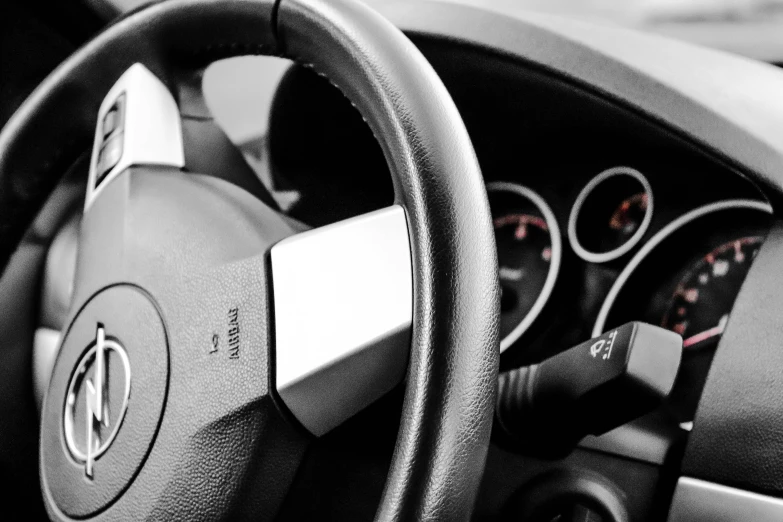 a steering wheel that is on display in a car