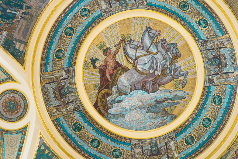 the ceiling inside of the cathedral features beautiful painted murals