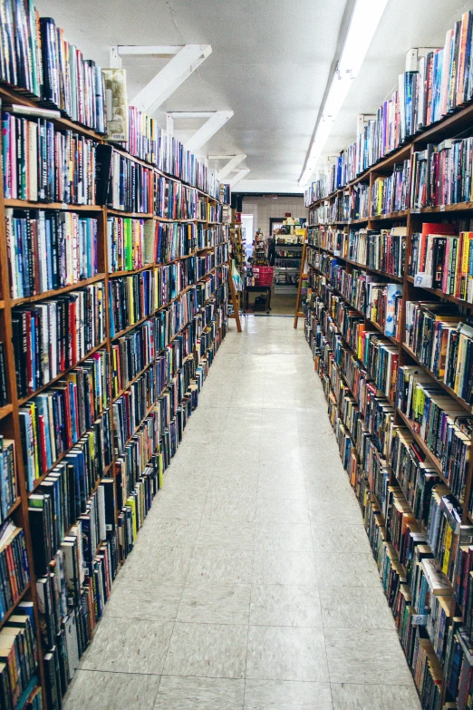 a large long row of books on shelves
