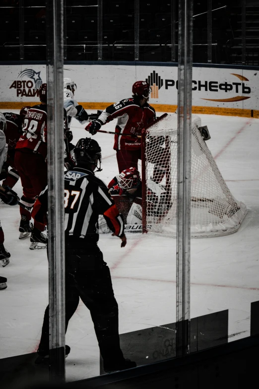 some guys are playing a game of hockey