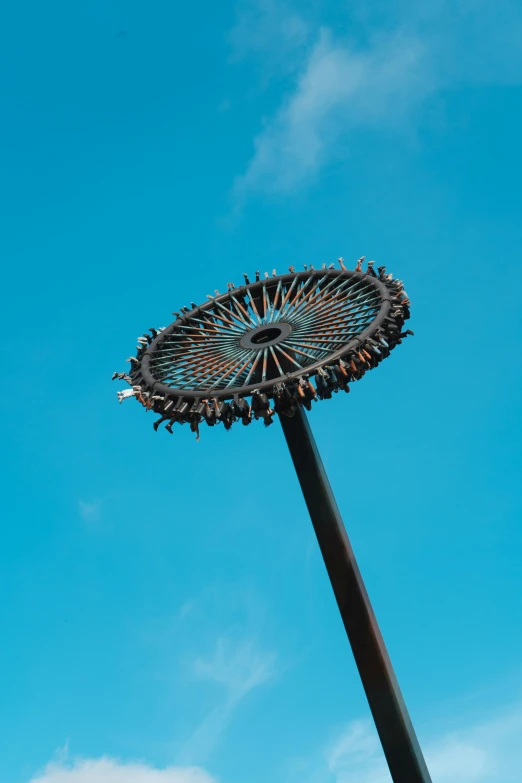 an amut park ride in the blue sky