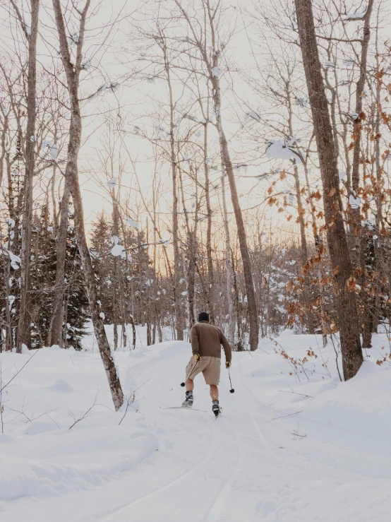 a person walking through the snow on a ski