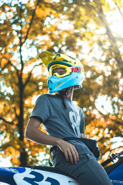 a man is sitting on top of a motor bike