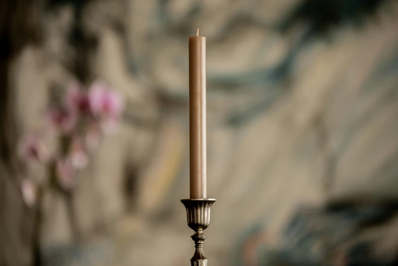 a candle is shown in the middle of a po