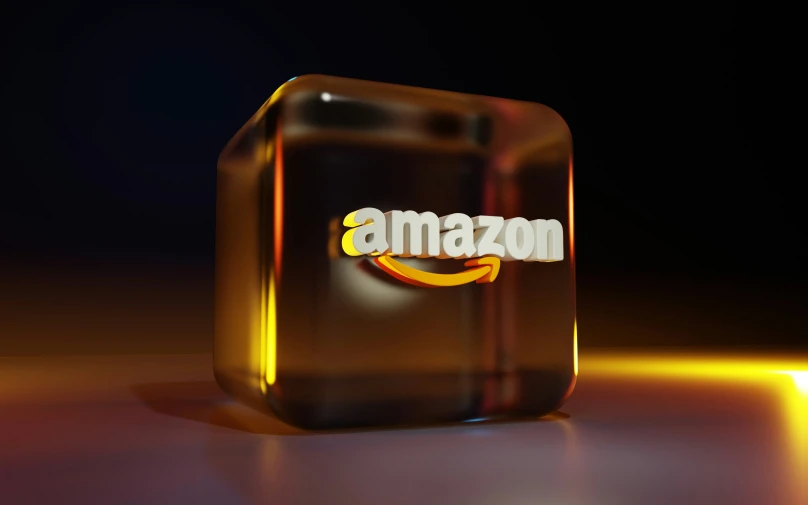 a shiny cube shaped po with a amazon logo