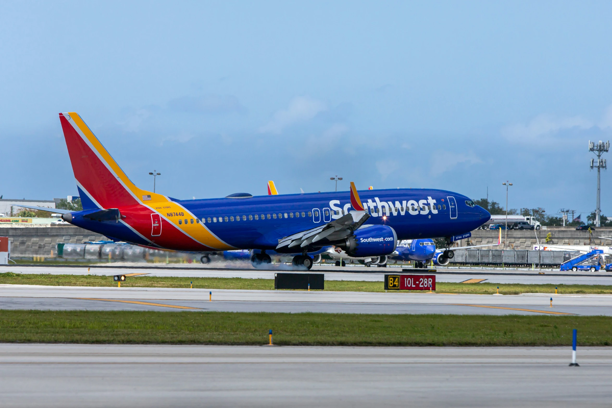 a southwest airlines plane on the runway waiting for passengers