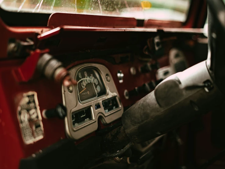 a vehicle dashboard with two dials and different gauges