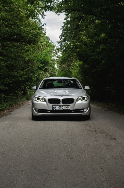 the car is driving down the very quiet road