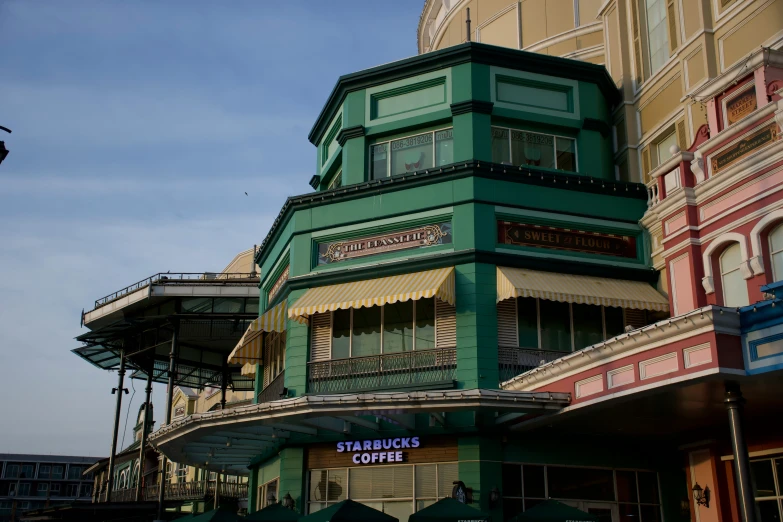 a store called starbuck's cafe with two towers