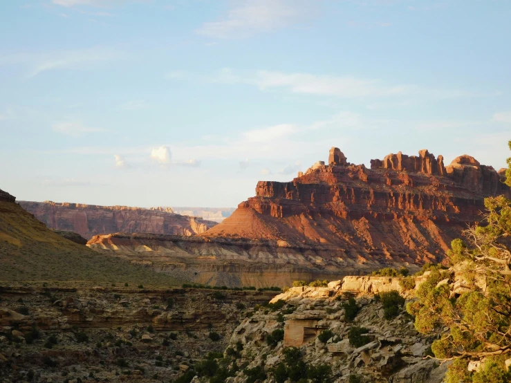 a view of some mountains in a big canyon